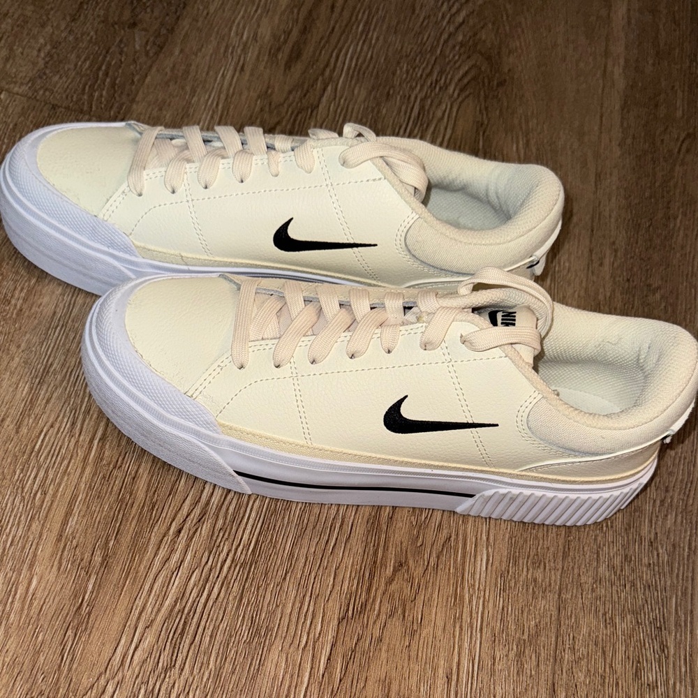 Nike Beige Sneakers with Black Logo